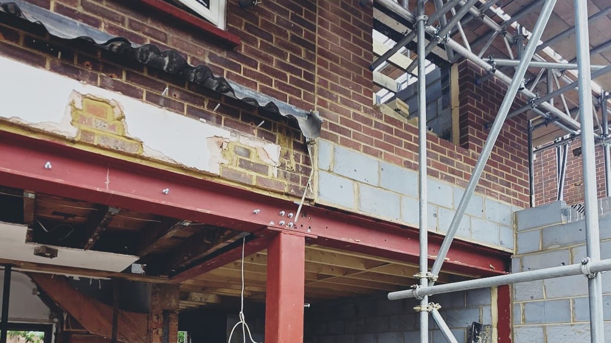 House extension steel beam and column installation